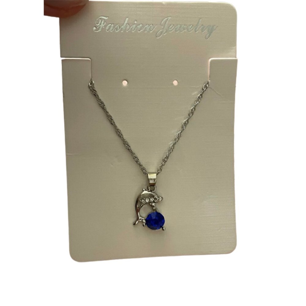Silver Dolphin Necklace with Blue Bead Pendant